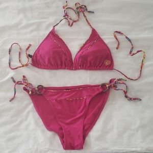 Hot pink bikini with rainbow accent and gold rings